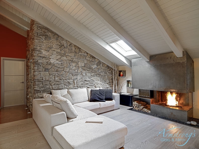 interior view of a modern living room with a skylight and fireplace